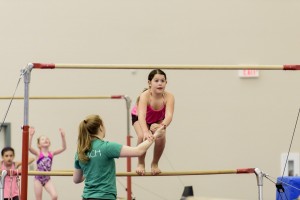 Girl balancing on a beam
